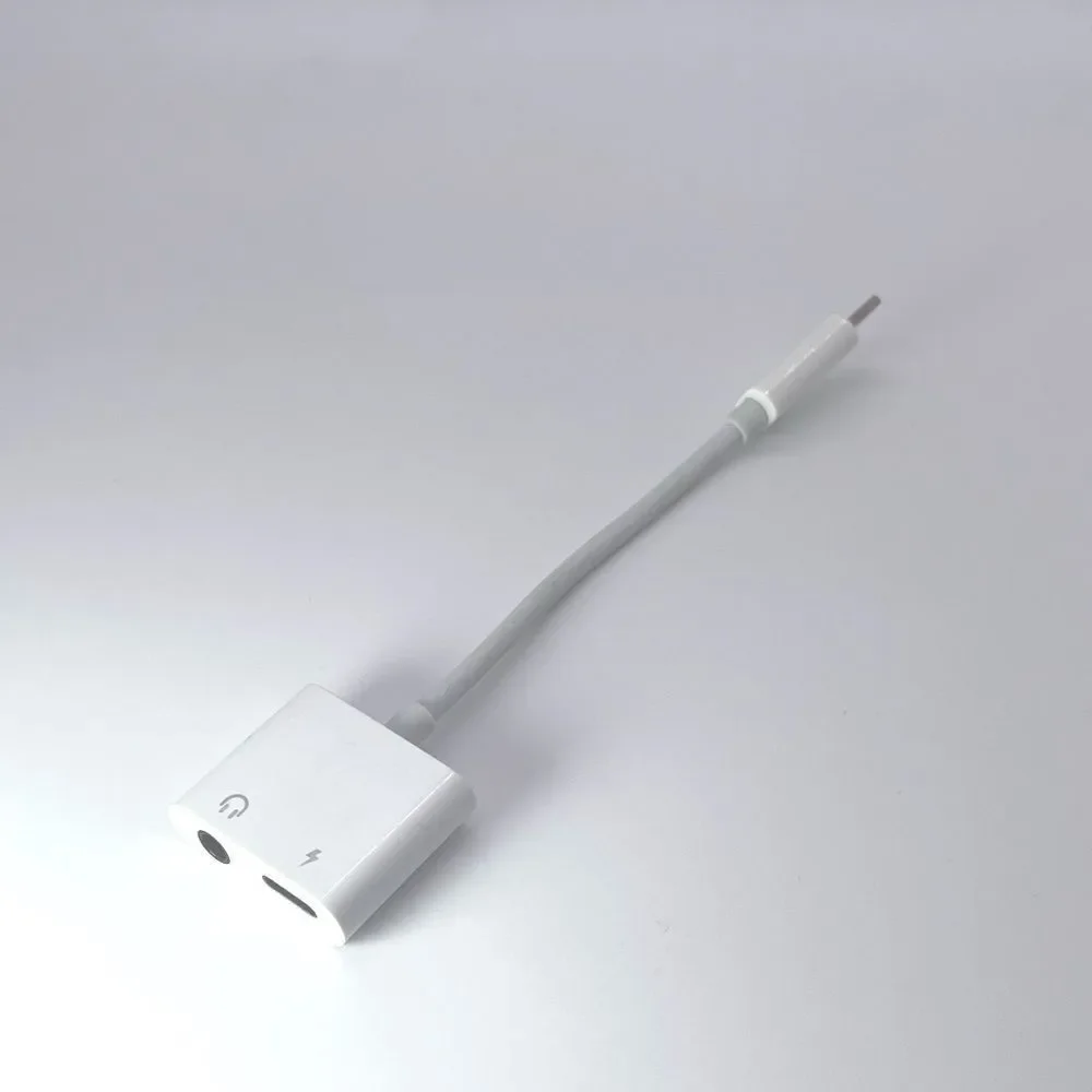 NWOT Apple 3.5mm Audio & Lightning Charging Rockstar Adapter